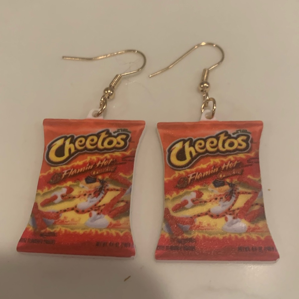 Flambéing hot Cheetos earrings! Super cute and fun! Never worn!